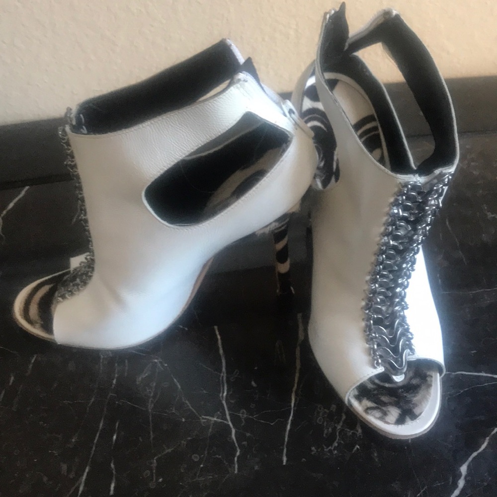 Manolo Blahnik white leather and black calf hair.